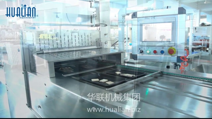 Автоматический конвейерный запайщик лотков Hualian Machinery HVT-450А/2  (вакуум, газ)